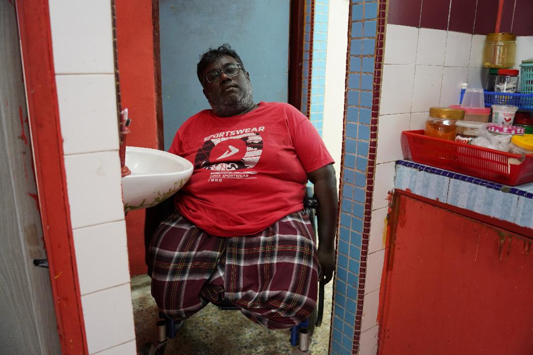 The narrow corner leading to the bathroom once made access impossible for Balan. [Photo by Lim Char Boo]