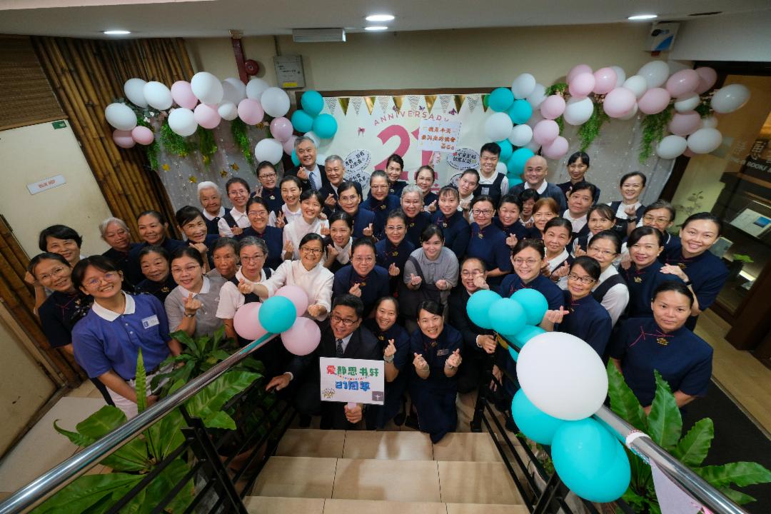 Volunteers gathered at the thoughtfully decorated entrance, ready to welcome guests. [Photo by Lim Chin Shein]